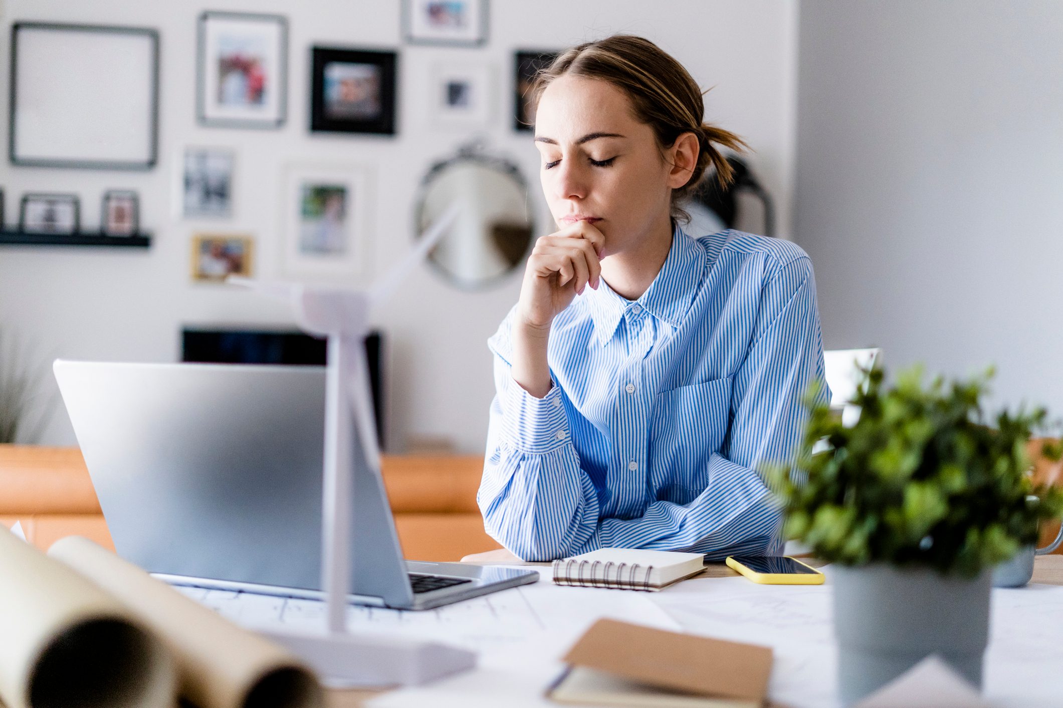 tired woman working from home
