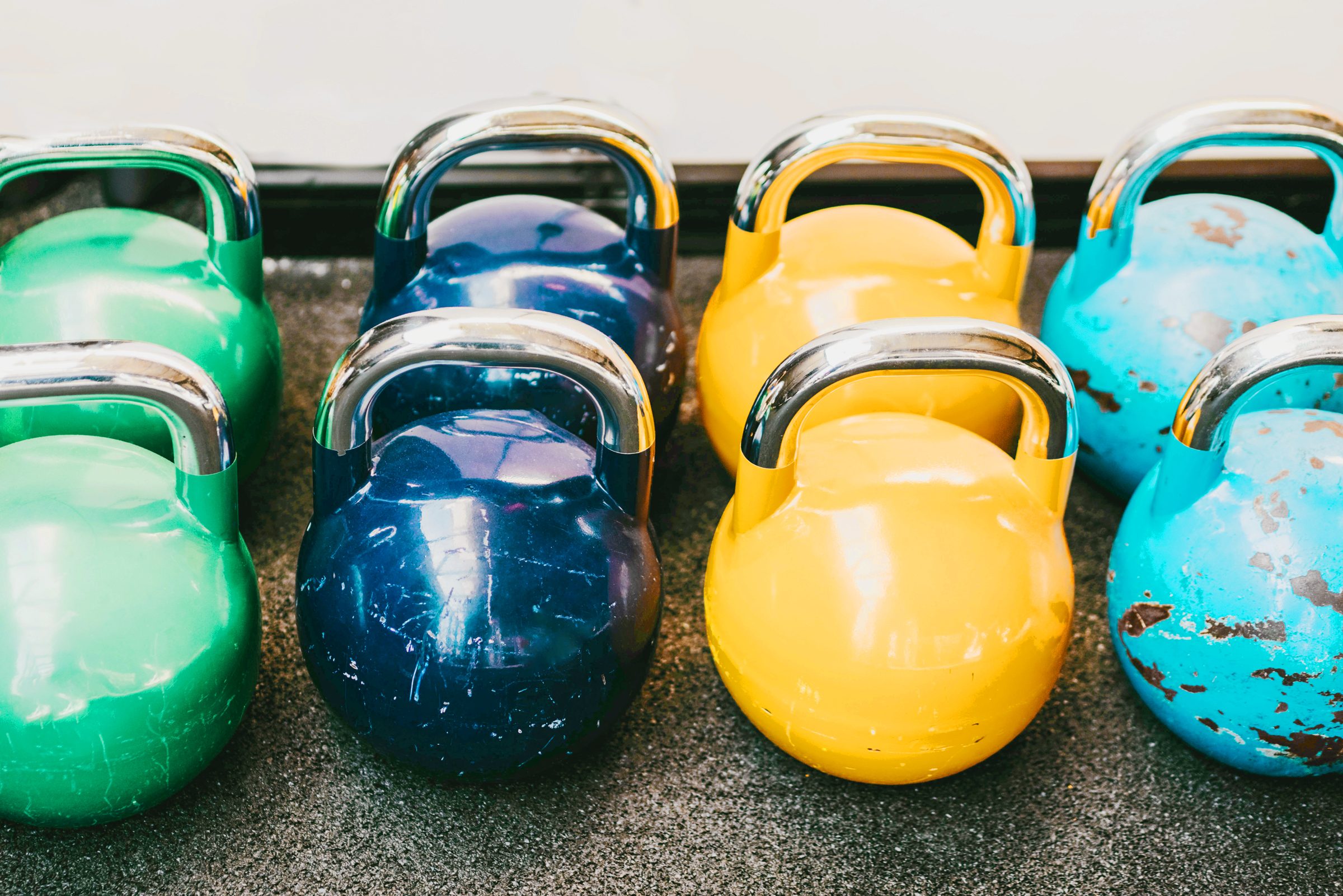 Rows of dumbbells in the gym