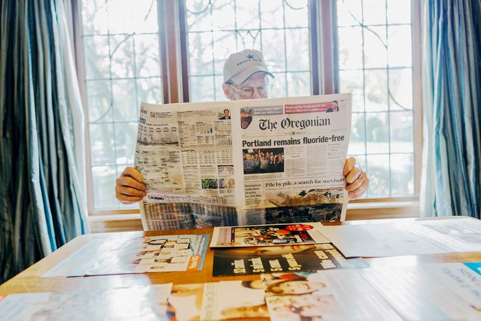 Kurt Ferré, a longtime pro fluoride activist and retired dentist, showing a collection of newspaper stories about the failed fluoridation campaign in Portland